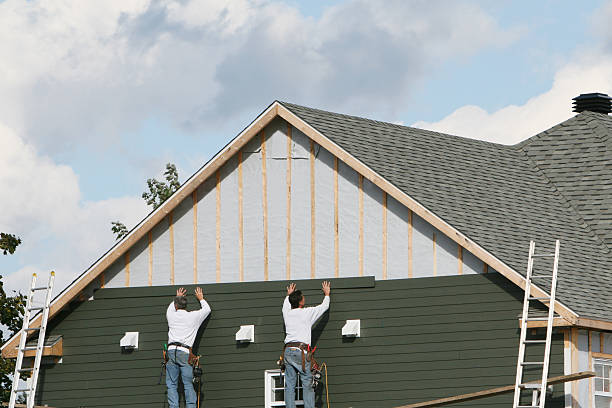 Professional Emergency Siding Repair technician working in Roanoke, TX